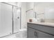 Clean bathroom with a shower, toilet and vanity at 8985 Stinger Dr, Davenport, FL 33896