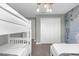 Bedroom with bunk beds and double bed, and a closet at 8985 Stinger Dr, Davenport, FL 33896