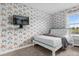 Bedroom with a full-size bed and rainbow wallpaper at 8985 Stinger Dr, Davenport, FL 33896