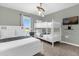 Bedroom with a queen bed and bunk beds at 8985 Stinger Dr, Davenport, FL 33896