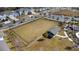 Community park with fenced-in play area and covered pavilion at 1254 Wispy Cypress Dr, Kissimmee, FL 34746