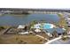 Resort-style community pool with a clubhouse and playground at 1254 Wispy Cypress Dr, Kissimmee, FL 34746