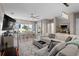 Open living area with sectional sofa and adjacent dining area at 1254 Wispy Cypress Dr, Kissimmee, FL 34746