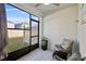 Relaxing screened porch with seating and backyard view at 1254 Wispy Cypress Dr, Kissimmee, FL 34746