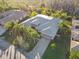 Aerial view of single-Gathering home with driveway at 135 Lemon Grove Dr, Poinciana, FL 34759