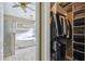 Bathroom with large closet and a luxurious soaking tub at 135 Lemon Grove Dr, Poinciana, FL 34759