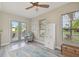 Bright guest room with access to a private patio at 135 Lemon Grove Dr, Poinciana, FL 34759