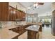 Gourmet kitchen boasting granite countertops and ample cabinetry at 135 Lemon Grove Dr, Poinciana, FL 34759
