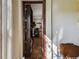Hidden room accessed through bookcase, offering extra storage at 135 Lemon Grove Dr, Poinciana, FL 34759
