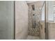 Spa-like shower with multi-head shower system and stylish tile work at 135 Lemon Grove Dr, Poinciana, FL 34759