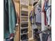 Large walk-in closet with ample shelving and hanging space at 135 Lemon Grove Dr, Poinciana, FL 34759
