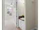 Small bathroom with granite vanity and access to bedroom at 2015 Grand Oak Dr, Kissimmee, FL 34744