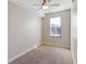 Bright bedroom with neutral walls, carpeting, and window at 2015 Grand Oak Dr, Kissimmee, FL 34744