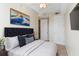 Primary bedroom with large closet and neutral decor at 2015 Grand Oak Dr, Kissimmee, FL 34744