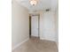 Bright bedroom with neutral walls, carpeting, and two closets at 2015 Grand Oak Dr, Kissimmee, FL 34744