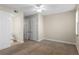 Spacious bedroom with ceiling fan and neutral carpeting at 2015 Grand Oak Dr, Kissimmee, FL 34744