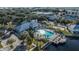 Resort-style community pool with adjacent playground at 2015 Grand Oak Dr, Kissimmee, FL 34744