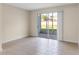 Living room with sliding doors leading to patio at 2015 Grand Oak Dr, Kissimmee, FL 34744