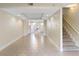 Living room with tile floors and kitchen view at 2015 Grand Oak Dr, Kissimmee, FL 34744