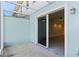 Screened patio with sliding glass doors leading to interior at 2015 Grand Oak Dr, Kissimmee, FL 34744