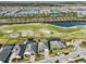 Aerial view of homes near golf course at 2937 Bella Flore Ter, New Smyrna Beach, FL 32168