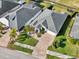 Single-Gathering home with paver driveway and landscaped yard at 2937 Bella Flore Ter, New Smyrna Beach, FL 32168
