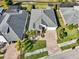 Aerial view of home with paved driveway at 2937 Bella Flore Ter, New Smyrna Beach, FL 32168