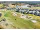 Aerial view of homes near golf course at 2937 Bella Flore Ter, New Smyrna Beach, FL 32168