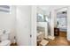 Main bathroom with toilet and access to the Primary bathroom at 2937 Bella Flore Ter, New Smyrna Beach, FL 32168