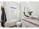 Bathroom with granite countertop, single vanity, and bathtub at 2937 Bella Flore Ter, New Smyrna Beach, FL 32168