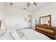 Spacious bedroom with double doors and light wood dresser at 2937 Bella Flore Ter, New Smyrna Beach, FL 32168