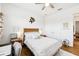 Cozy bedroom with wood bed frame and built in workspace at 2937 Bella Flore Ter, New Smyrna Beach, FL 32168