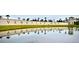 Venetian Bay community entrance with a reflecting pond at 2937 Bella Flore Ter, New Smyrna Beach, FL 32168