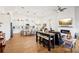 Open concept kitchen and living area with hardwood floors at 2937 Bella Flore Ter, New Smyrna Beach, FL 32168
