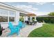 Relaxing patio with seating and dining area at 2937 Bella Flore Ter, New Smyrna Beach, FL 32168