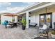 Outdoor patio with seating, dining area, and string lights at 2937 Bella Flore Ter, New Smyrna Beach, FL 32168