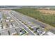 Aerial view of community with lake and conservation area at 3142 Viceroy Ct, Poinciana, FL 34759