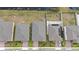 Aerial view of houses with gray roofs and brick driveways at 3142 Viceroy Ct, Poinciana, FL 34759