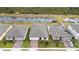 Aerial view of houses with gray roofs and brick driveways at 3142 Viceroy Ct, Poinciana, FL 34759