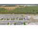 Aerial view of houses near water, showcasing a community setting at 3142 Viceroy Ct, Poinciana, FL 34759