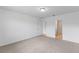 Spacious bedroom with carpet and access to bathroom at 3142 Viceroy Ct, Poinciana, FL 34759