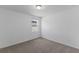Bright bedroom with a window and neutral carpeting at 3142 Viceroy Ct, Poinciana, FL 34759