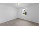 Well-lit bedroom with window and carpeted floor at 3142 Viceroy Ct, Poinciana, FL 34759