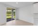 Breakfast nook with tile floor and sliding glass door to patio at 3142 Viceroy Ct, Poinciana, FL 34759