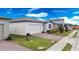Row of homes with brick paver driveways and landscaping at 3142 Viceroy Ct, Poinciana, FL 34759