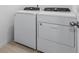 Laundry room with Whirlpool washer and dryer at 3142 Viceroy Ct, Poinciana, FL 34759
