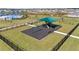 Community playground with shade structure near the pool at 3142 Viceroy Ct, Poinciana, FL 34759