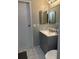 Clean bathroom with vanity, toilet and mirror at 3209 Windover Ave, Kissimmee, FL 34741