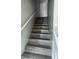 Stairs with gray wood-look laminate at 3209 Windover Ave, Kissimmee, FL 34741