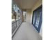 Spacious balcony features double doors and screened enclosure at 3341 Whitestone Cir # 205, Kissimmee, FL 34741